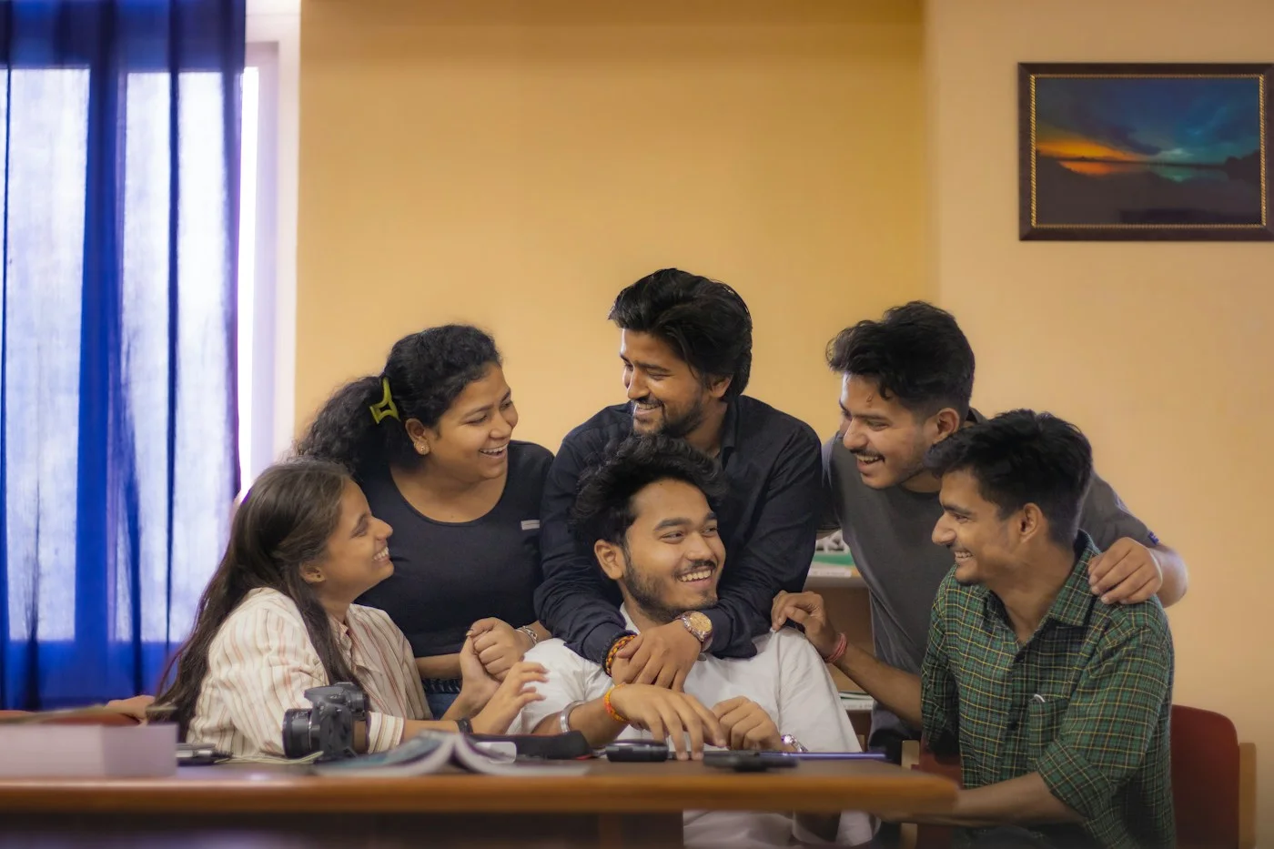 Students working together at a table in New Delhi
