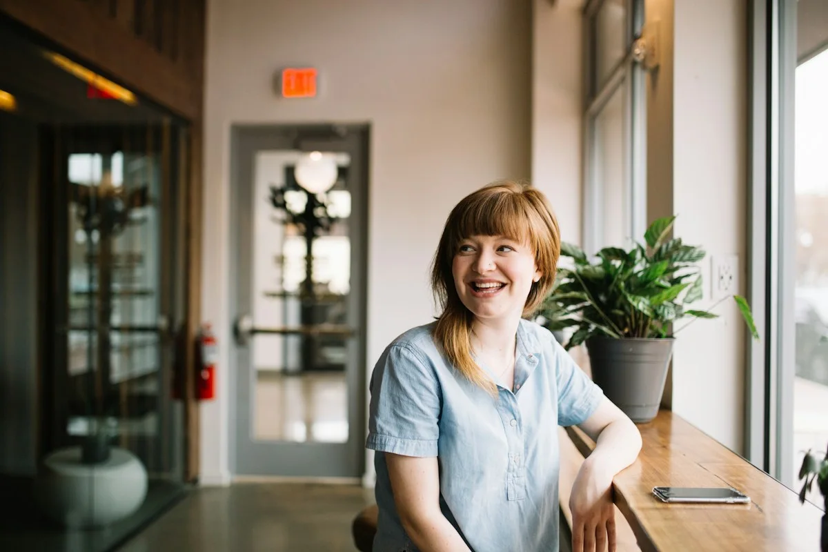 A woman using a laptop for independent work